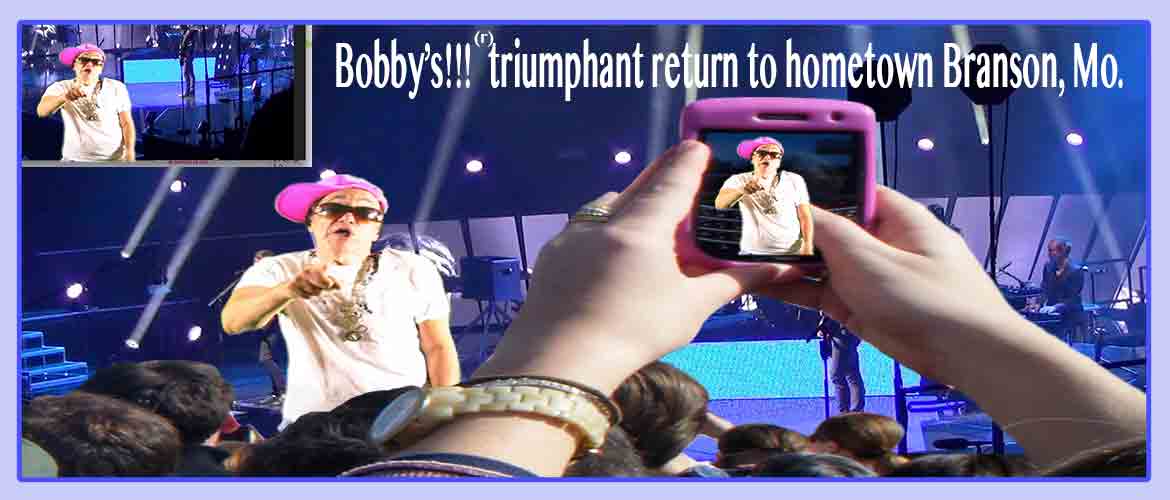 Bobby performs in large arena.